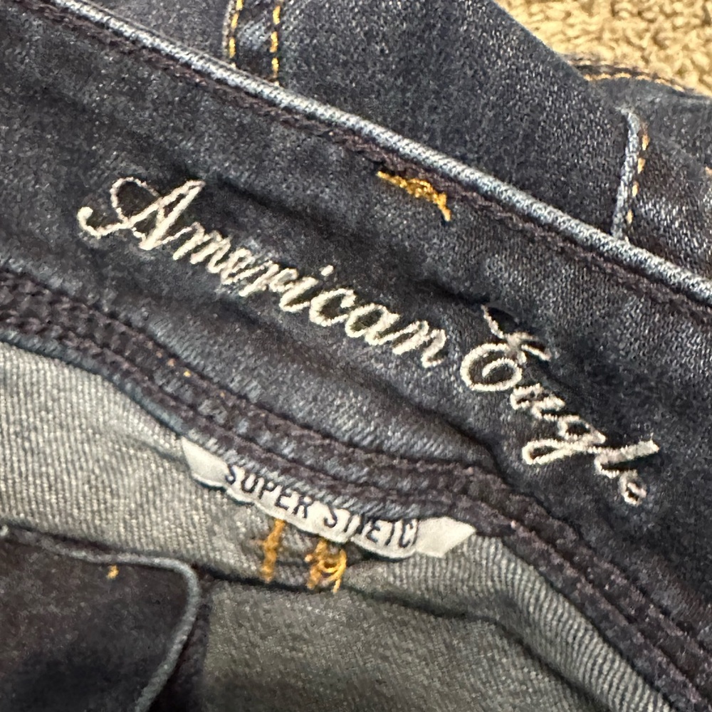American Eagle Dark Wash Women’s Jeans - super stretch slim boot w/RawHem - Picture 7 of 9